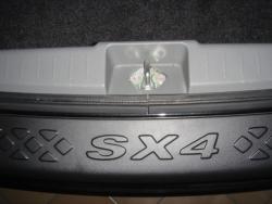 Csomagt�r �lv�d� Suzuki SX4 4 ajt�s Sedan